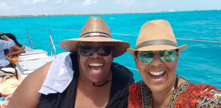 Black Women Smiling on Catamaran